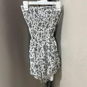 Black and white strapless romper.